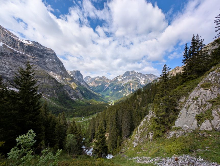Stunning mountainous landscape of Vanoise National Park, France, with lush valleys and towering peaks.